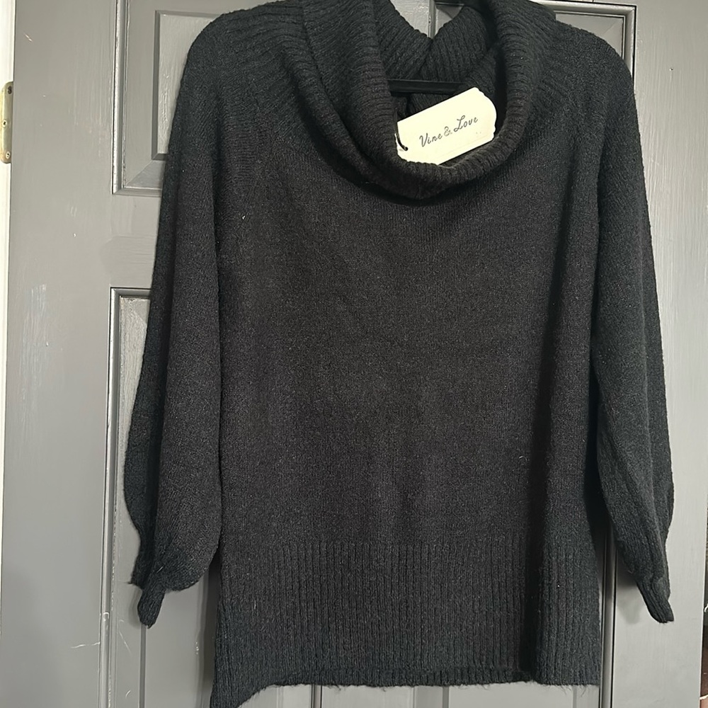 New w/tags women sweater black sz medium 66% acrylic, 31% nylon, & 3% spandex.